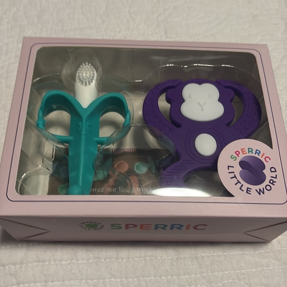 Teething Toy. New‎ in Packaging. One with Brush.